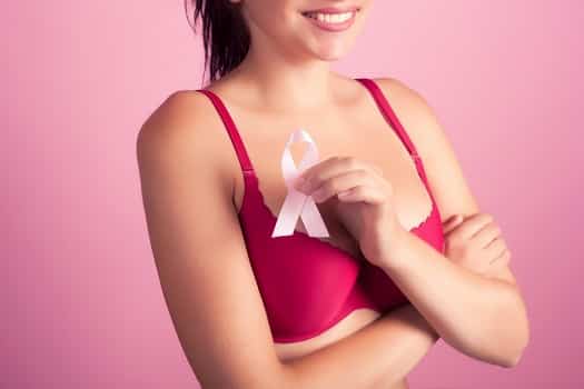 woman breast cancer awareness ribbon