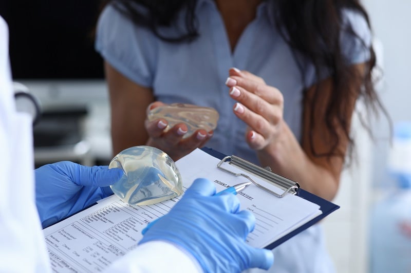 Woman considering implant reconstruction Denver